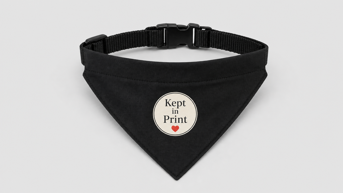 Personalised pet bandana with the Kept in Print round logo centred on it